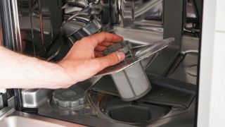 how to remove a dishwasher filter hand in dishwasher lifting out filter