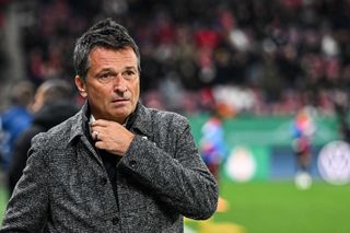 Christian Heidel of 1.FSV Mainz 05 Looks on during the DFB Cup round of 16 match between 1. FSV Mainz 05 and FC Bayern München at MEWA Arena on February 1, 2023 in Mainz, Germany.