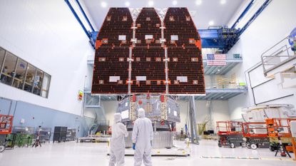 Technicians connect the inner and outer segments of NASA's Nancy Grace Roman Space Telescope in Maryland.