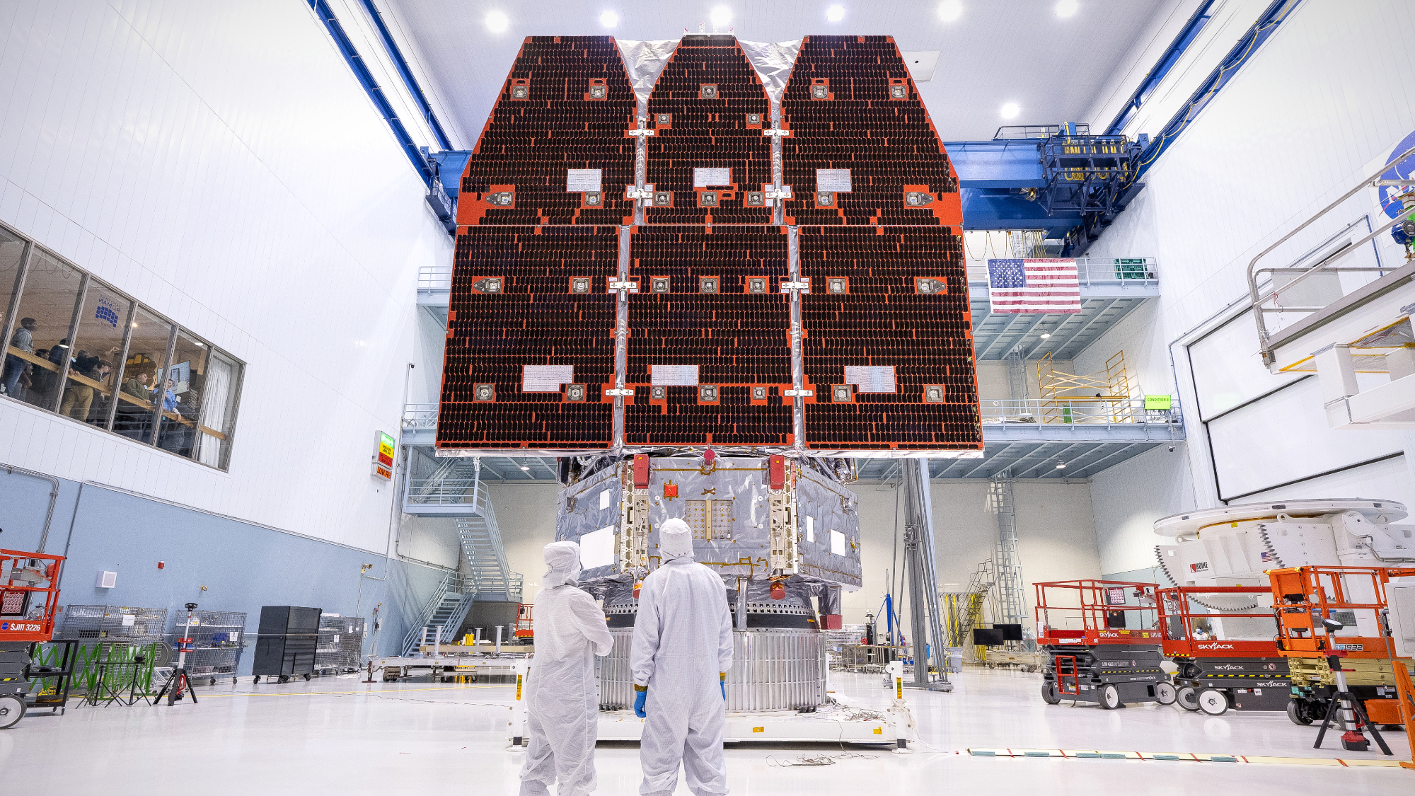 Technicians connect the inner and outer segments of NASA's Nancy Grace Roman Space Telescope in Maryland.