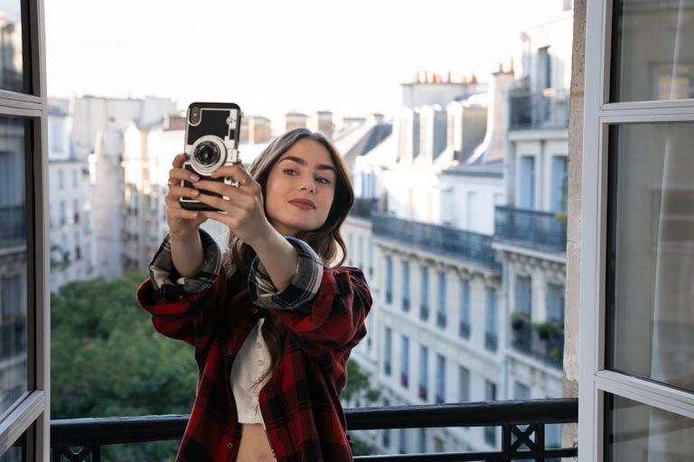 LILY COLLINS as EMILY in episode 101 of EMILY IN PARIS - shows like Emily in Paris