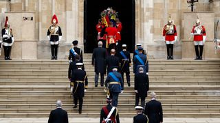 Pall bearers carry the coffin of Queen Elizabeth II into St. George's Chapel