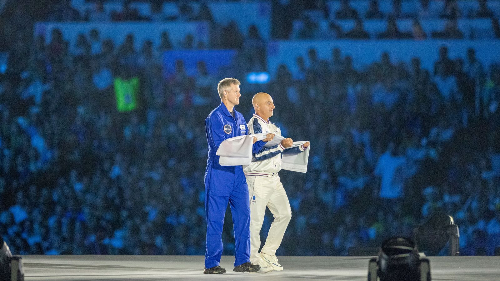 A photo of John McFall in his ESA uniform at the opening ceremony of the 2024 Paralympic Games in Paris