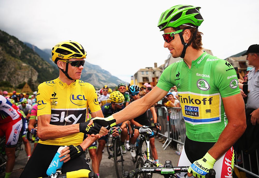 Yellow jersey Chris Froome (Team Sky) and green jersey Peter Sagan (Tinkoff-Saxo) shake hands at the start of stage 20