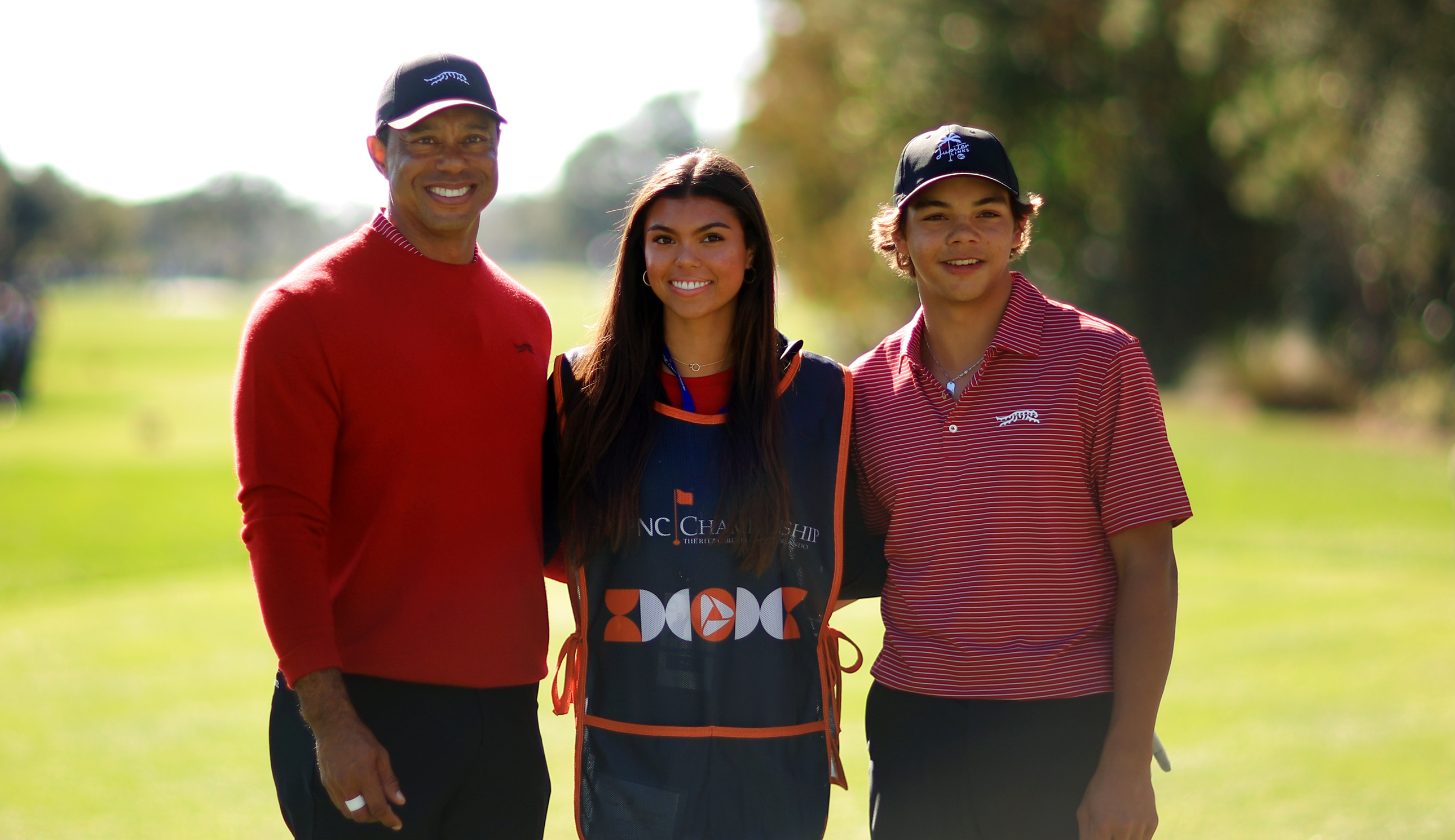 Tiger, Sam and Charlie Woods pose for a photo