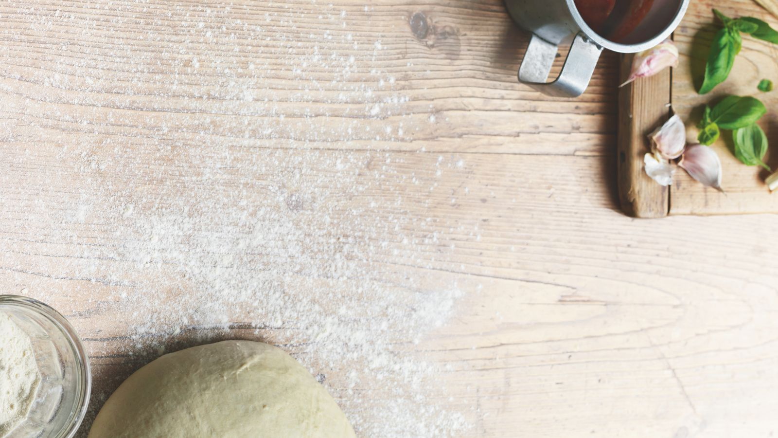 Dough, flour, tomato sauce