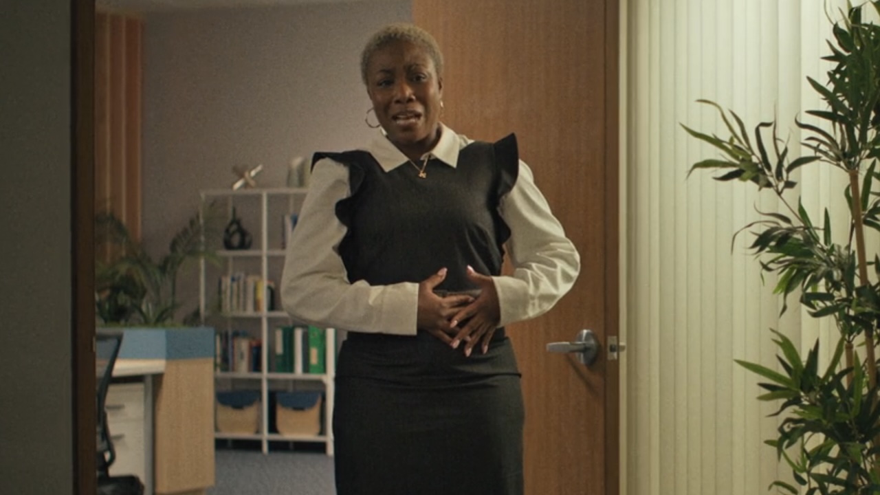 Woman complaining to Ron about using a magnet on her stomach in The Chair Company Season 1