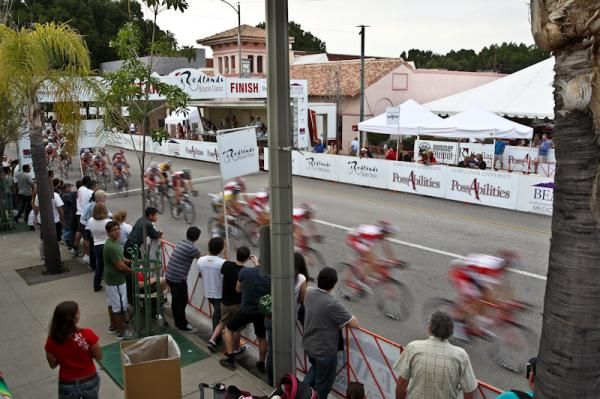 Fans watch as the race speeds past