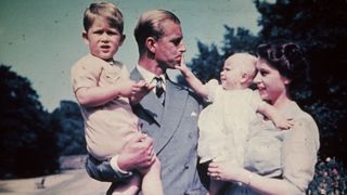 Princess Elizabeth with her husband Prince Philip, Duke of Edinburgh, and their children Prince Charles and Princess Anne, August 1951.