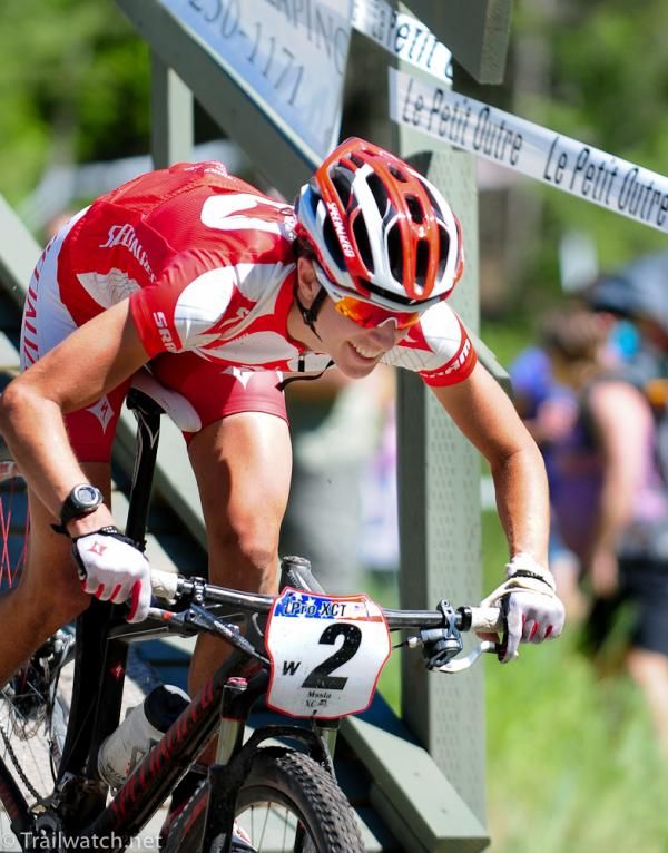 Lea Davison (Specialized) comes off the fly-over knowing she has the race won