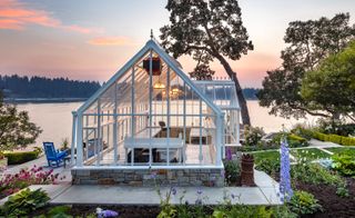 Glass and brick greenhouse by the sea