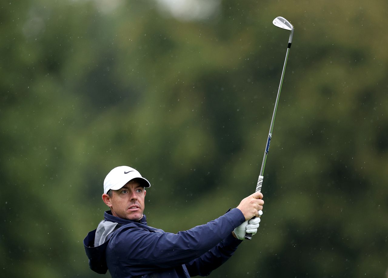 Rory McIlroy hits a wedge into the green