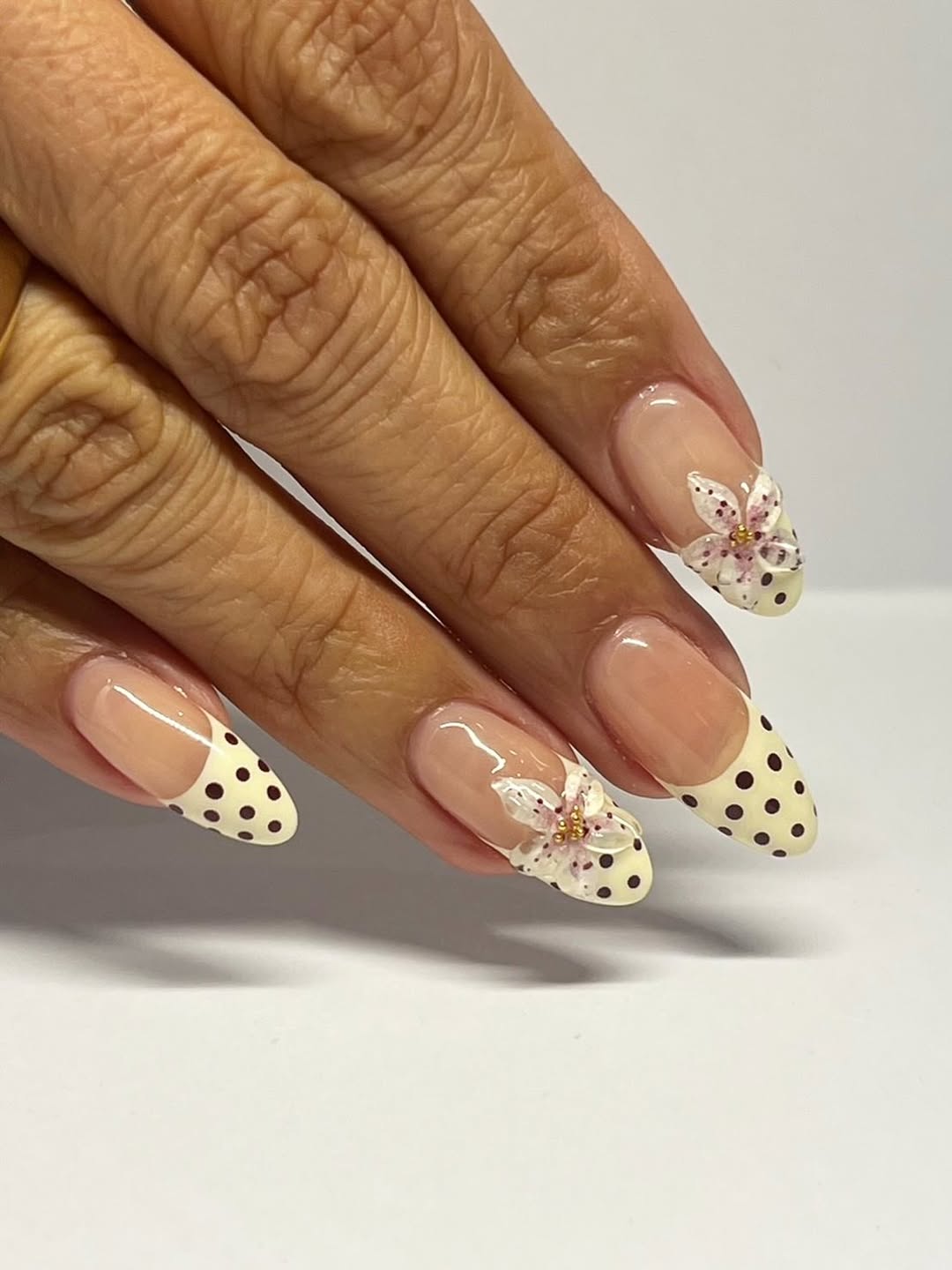 polka dot nails with 3D flowers