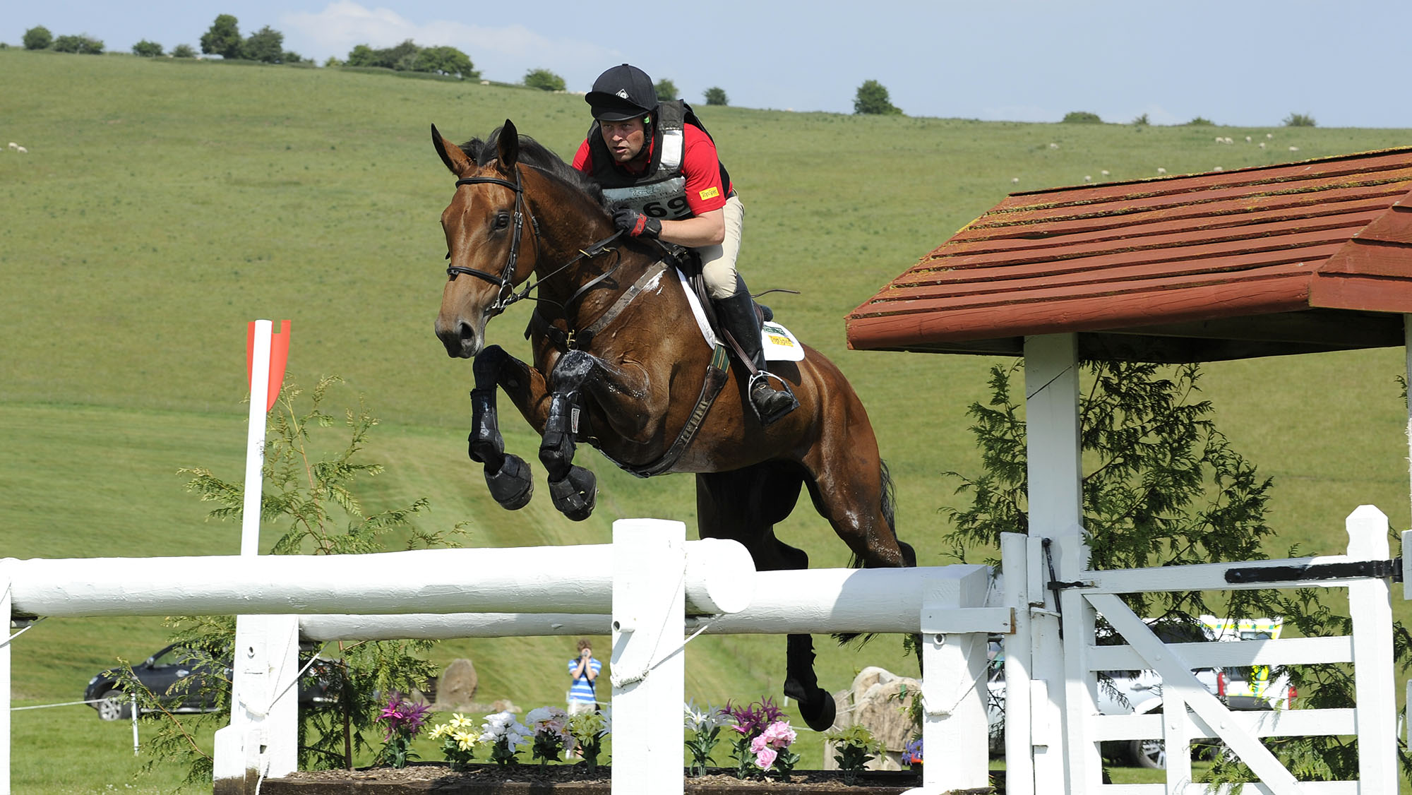 Andrew Heffernan and Millthyme Corolla jump a cross-country fence at Barbury.