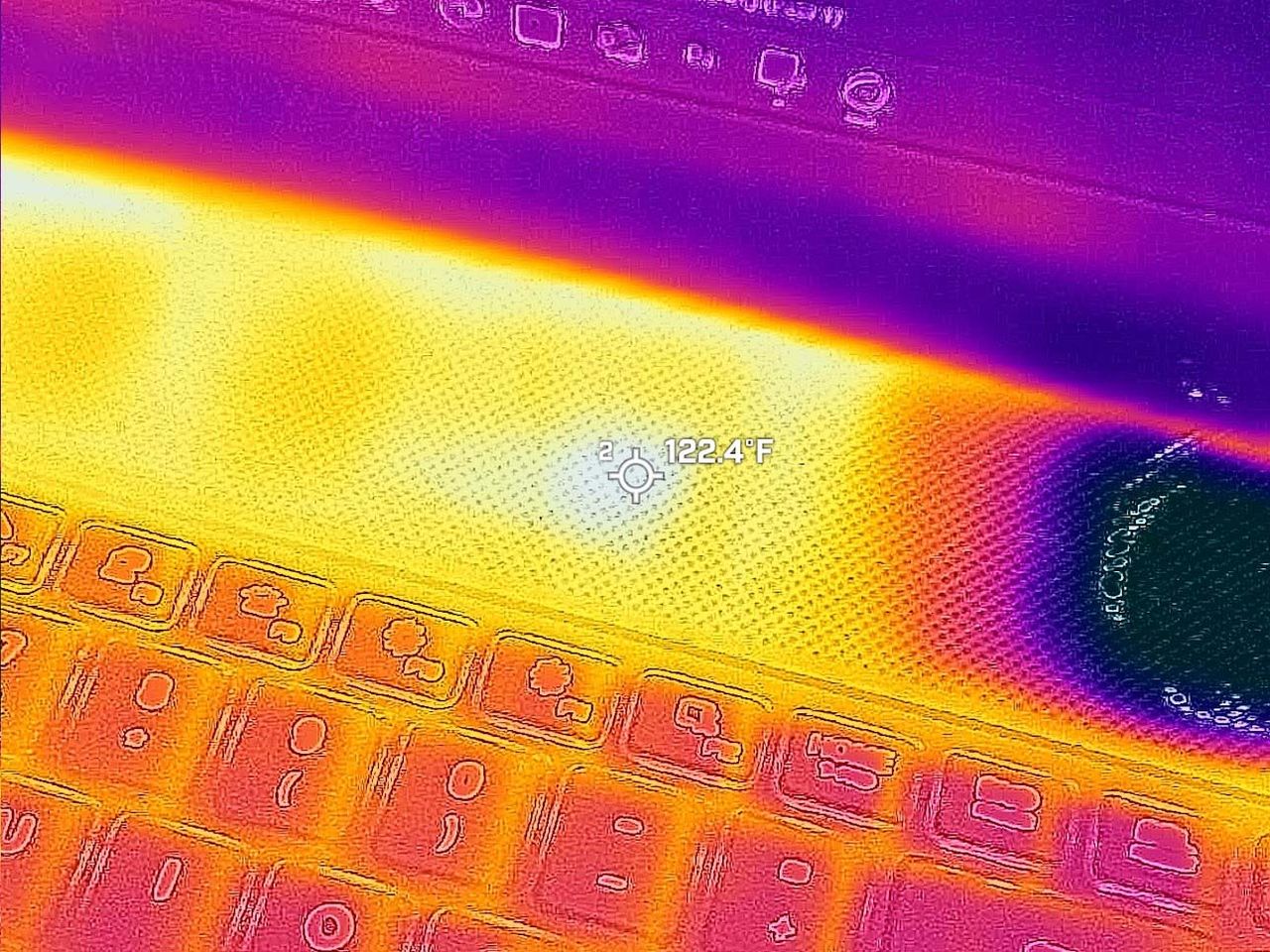 Images taken of the Alienware Area-51 16 gaming laptop with a thermal camera that focuses on the area above the keyboard.