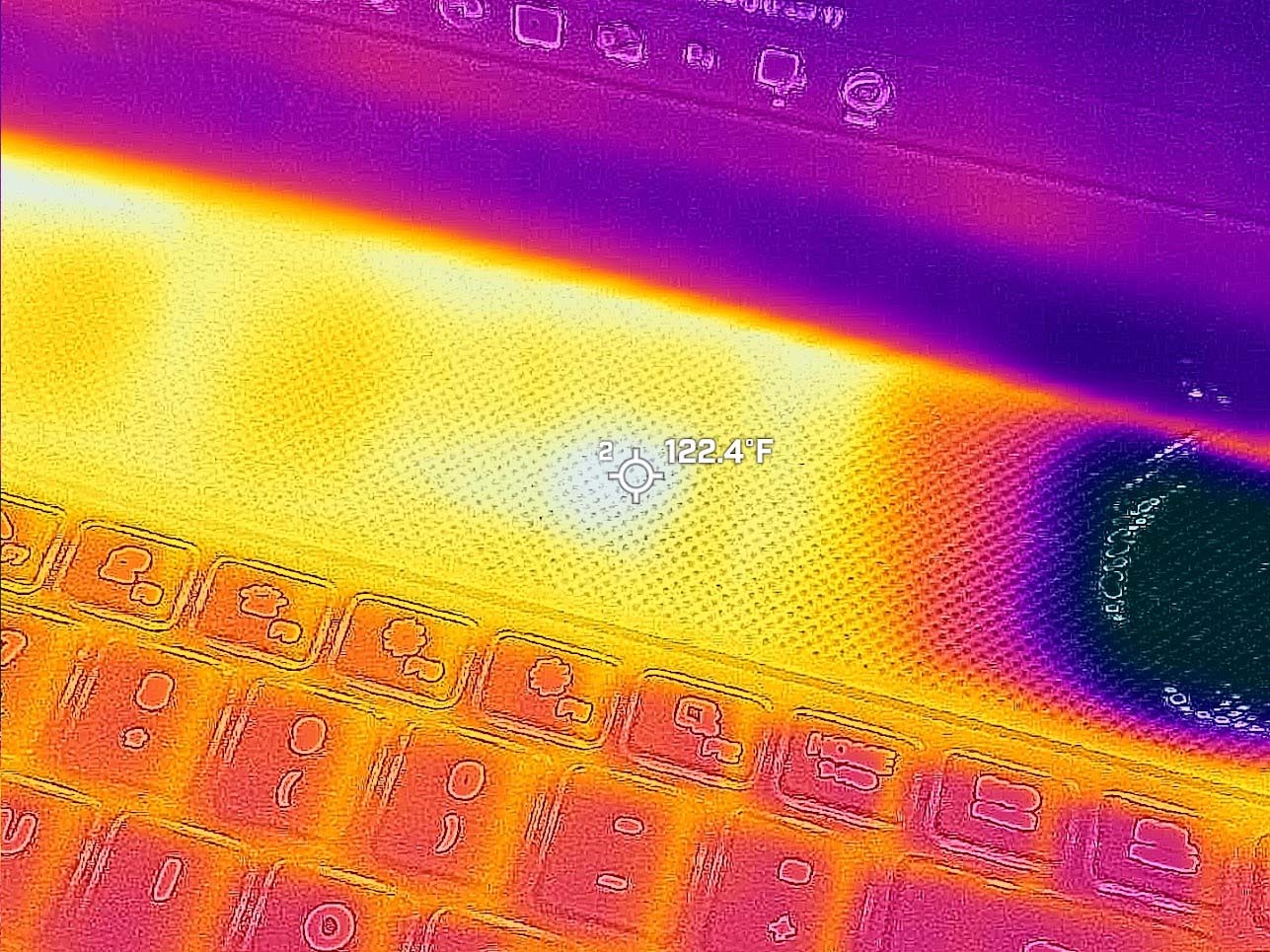 Images taken of the Alienware Area-51 16 gaming laptop with a thermal camera that focuses on the area above the keyboard.
