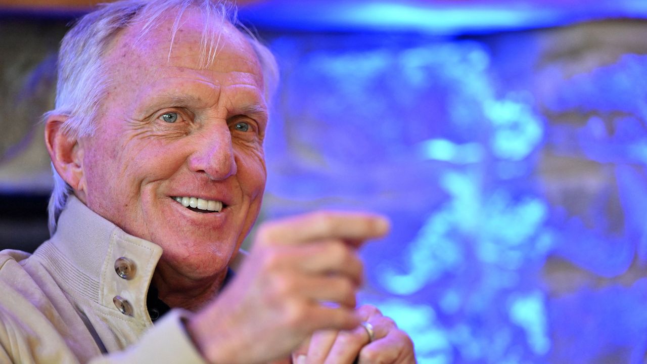 Greg Norman pictured speaking at a press conference