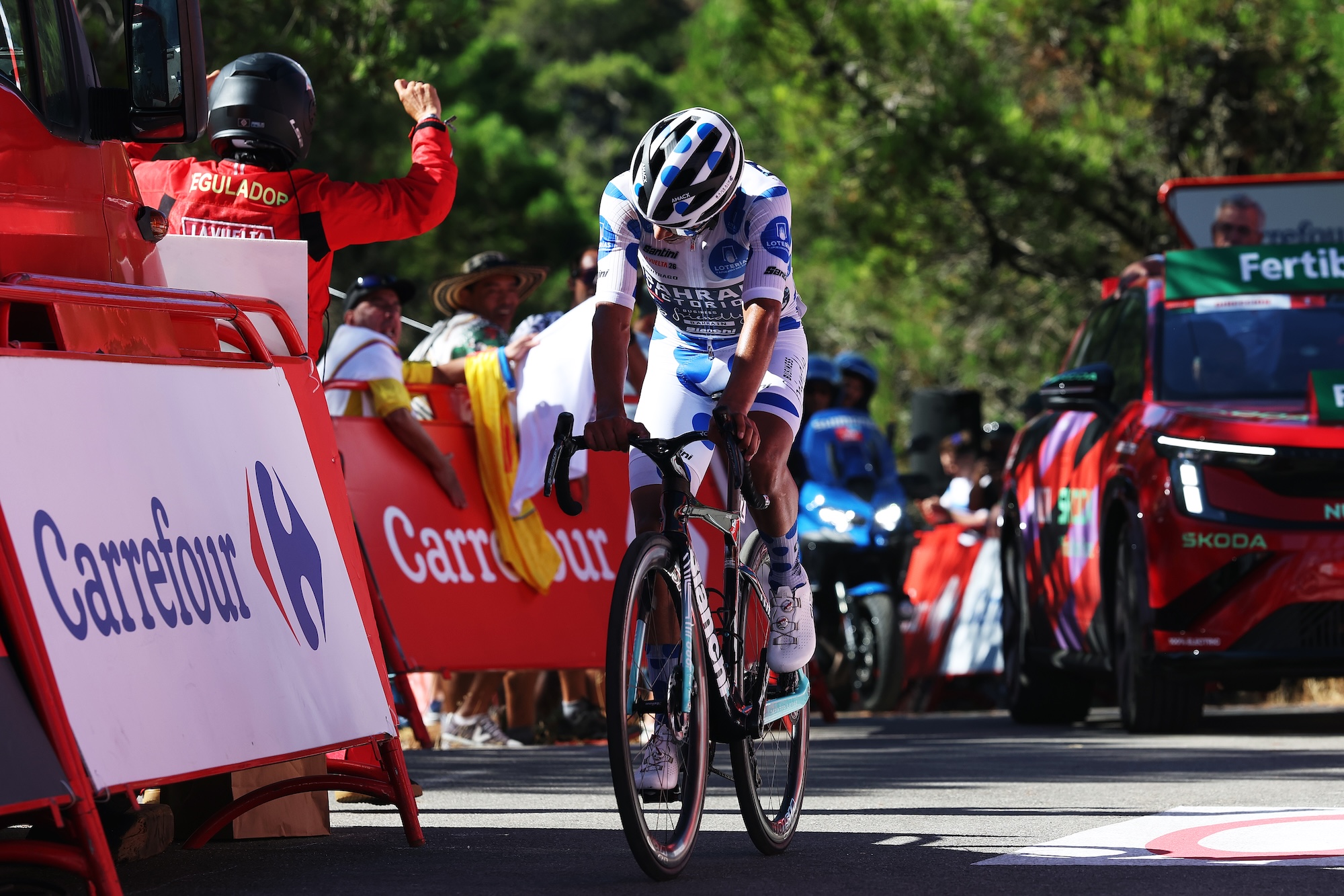 Santiago Buitrago of Colombia and Team Bahrain Victorious - Polka Dot Mountain Jersey crosses the finish line in second place