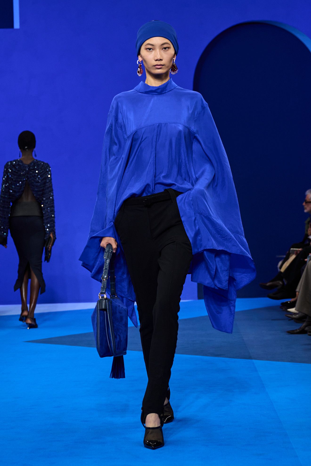 An image of a cobalt blue cape blouse on Lanvin's spring/summer 2026 collection, which was staged in September 2025 in Paris.