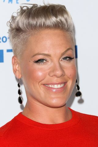 Pink has a bleached pixie cut whilst attending the Autism Speaks To Los Angeles Celebrity Chef Gala at Barker Hangar on October 8, 2015 in Santa Monica, California.