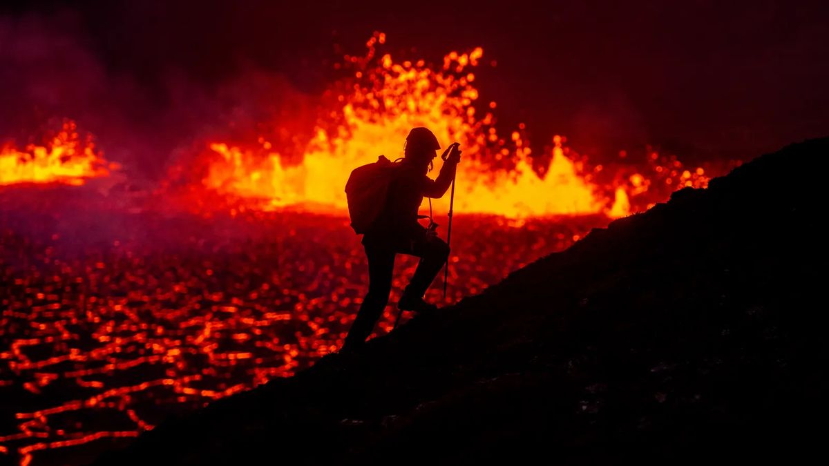 Hot stuff! Photo of hiker braving an erupting volcano shortlisted for award