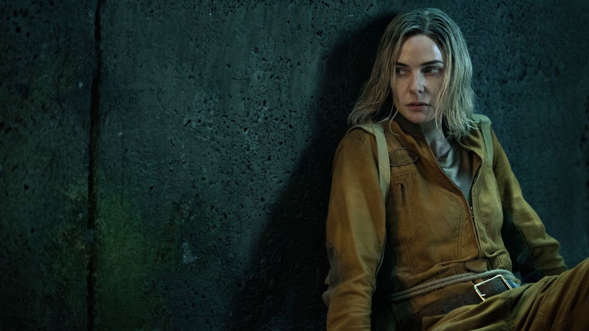 Rebecca Ferguson leans against a wall in &quot;Silo&quot; season 2