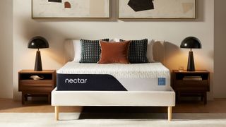 The Nectar Classic Memory Foam Mattress placed on a white bedframe in a stylish bedroom