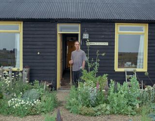 Derek Jarman at Prospect Cottage. © Howard Sooley.