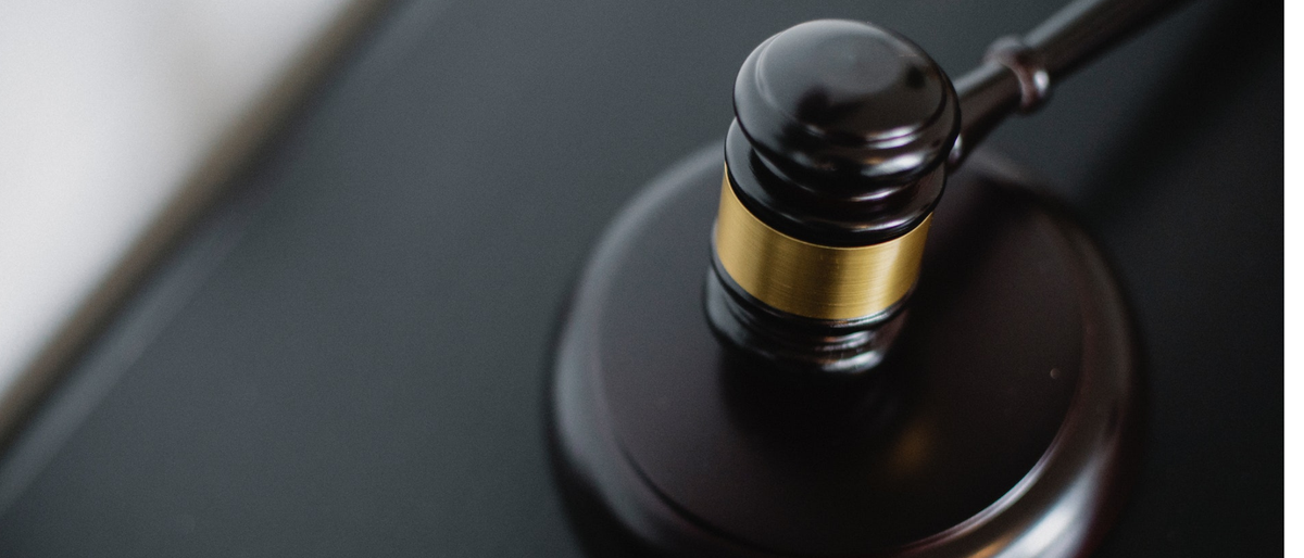 Gavel on a black-top desk