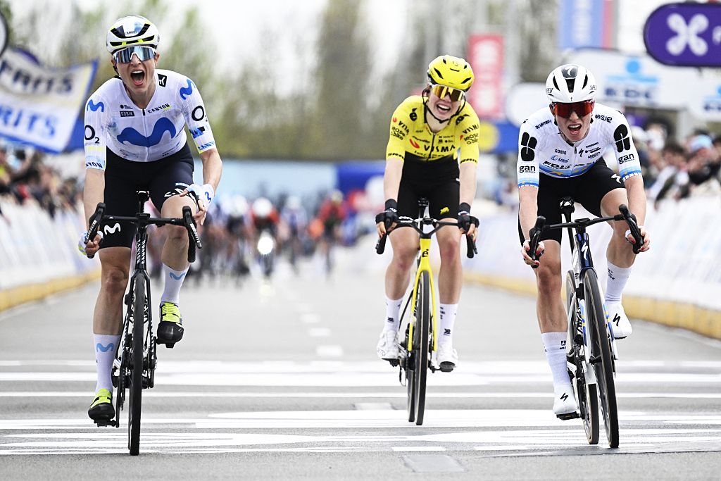 Swiss Marlen Reusser of Movistar Team, Dutch Lieke Nooijen of Team Visma-Lease a Bike and Dutch Demi Vollering of FDJ United-SUEZ cross the finish line of the women elite race of the 'Dwars Door Vlaanderen' cycling event, 128,9km from Roeselare to Waregem, Wednesday 01 April 2026.BELGA PHOTO TOM GOYVAERTS (Photo by Tom Goyvaerts / BELGA MAG / Belga via AFP)