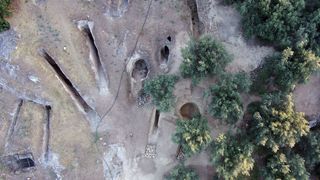 A bird's-eye view showing the two newly discovered tombs on the eastern side of the Mycenaean cemetery at Aidonia, next to tombs from a previous excavation.