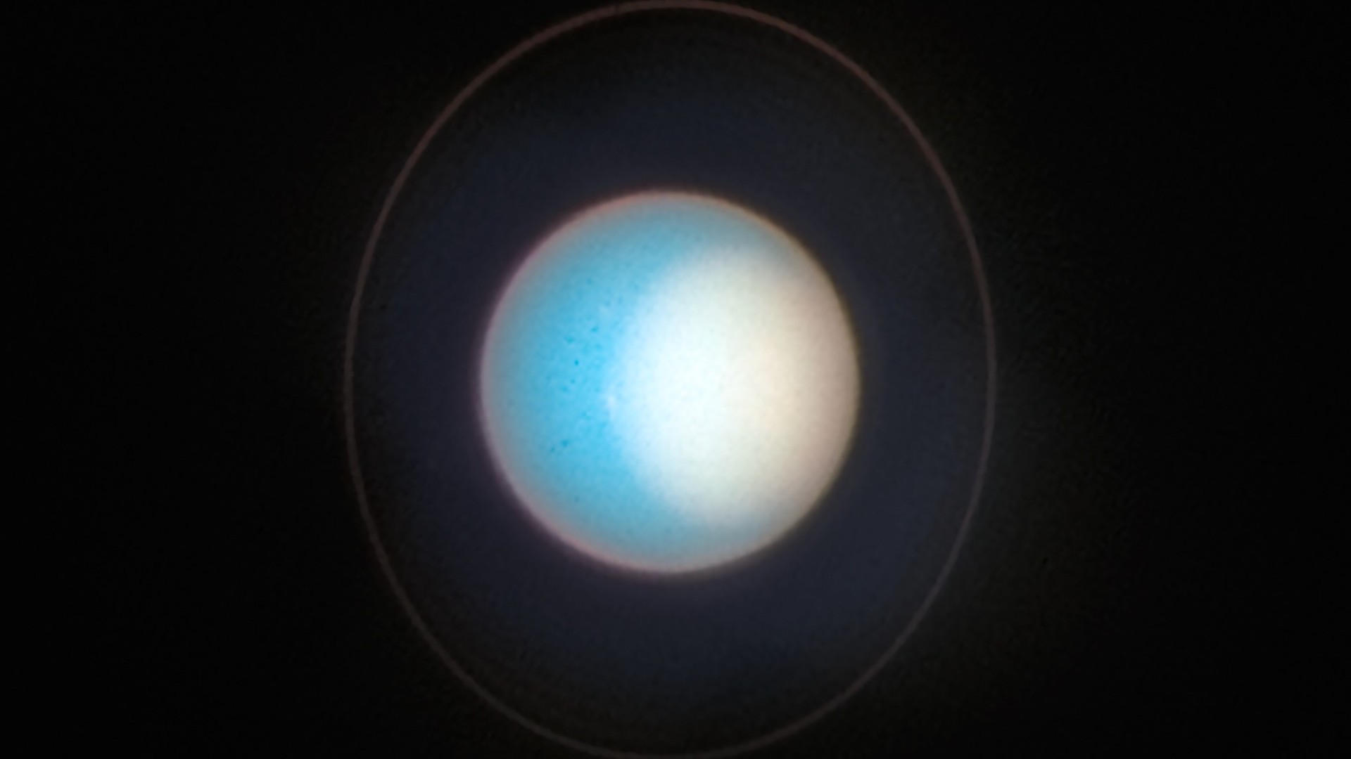 Uranus' bright polar cap, imaged by the Hubble Space Telescope in 2022.