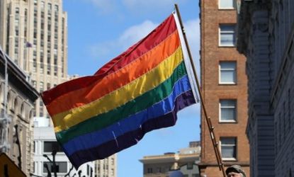 A man waves a gay pride flag in San Francisco: On Thursday, a New York court became the second federal court to rule that the Defense of Marriage Act, which designates marriage as between one