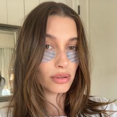 Hailey Bieber wearing Rhode's new Peptide Eye Prep patches