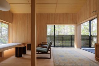 minimalist living space at Shishi-iwa House by Ryue Nishizawa