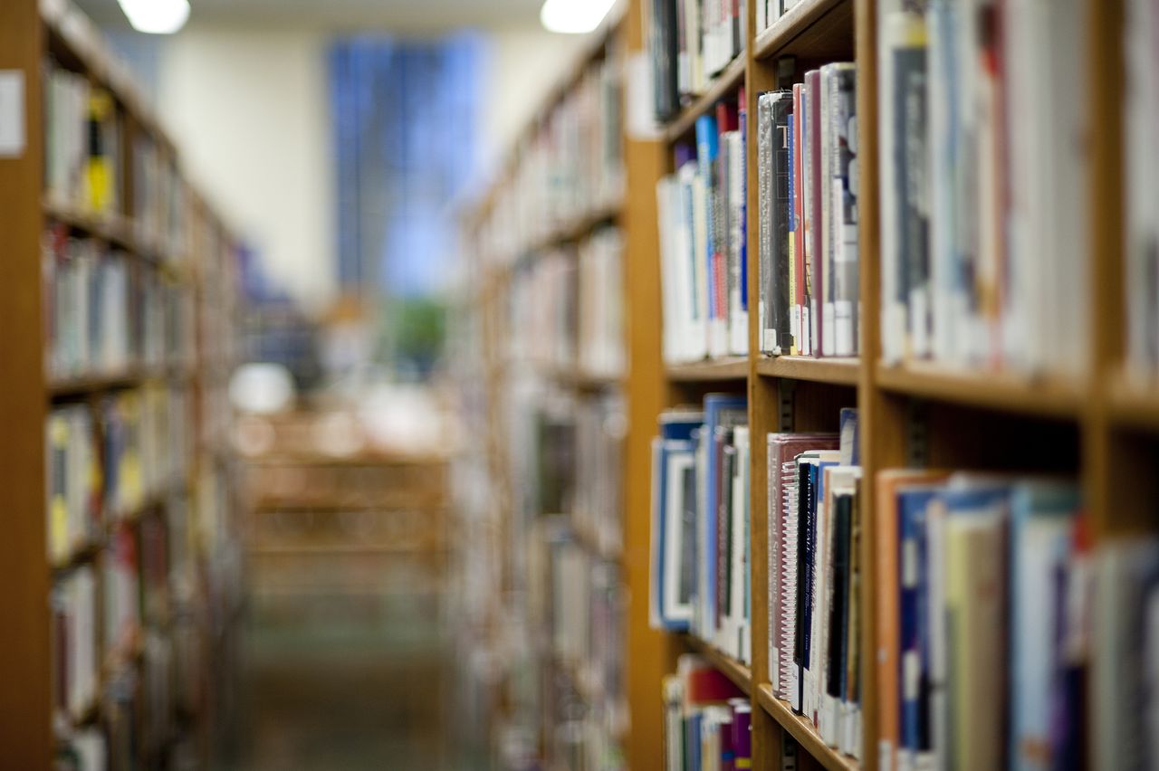 Books on shelf in library