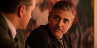 Frank Stokes (George Clooney) looks at James Granger in The Monuments Men (2014)
