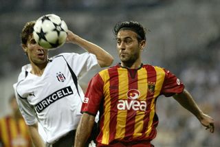 Hasan Şaş (right) on the ball for Galatasaray against Besiktas in September 2004.