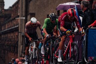 Pedersen with Pogacar and Van der Poel battle on in the rain at worlds in Glasgow
