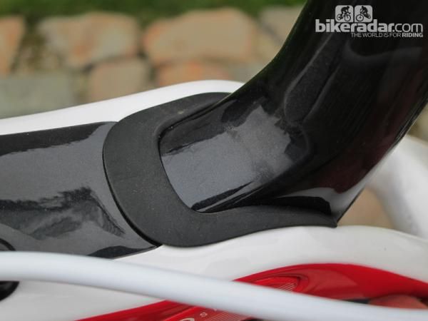 A rubber seal is meant to protect the IsoSpeed bearings and axle from weather but it's really more of a dust cover