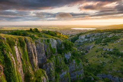 View over Cheddar Gorge and the village of Cheddar on the southern edge of the Mendip Hills, Somerset, England.