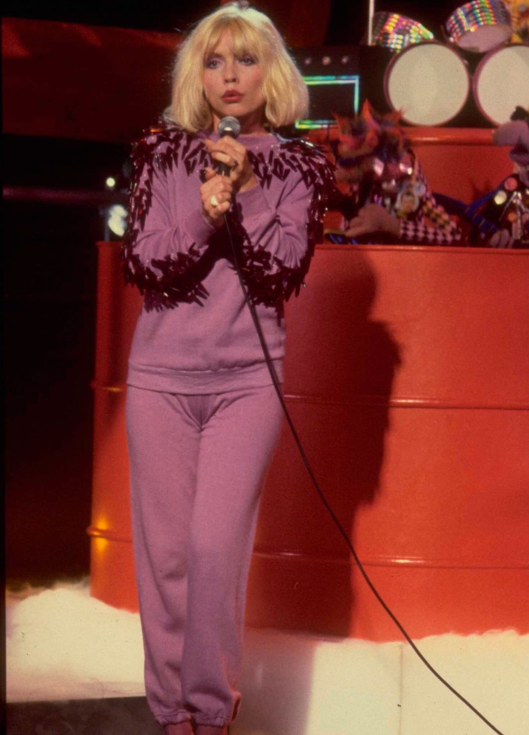 Blondie vocalist Debbie Harry performing the song 'Call Me' on the set of The Muppet Show at Elstree Studios, Hertfordshire, circa August 1980.