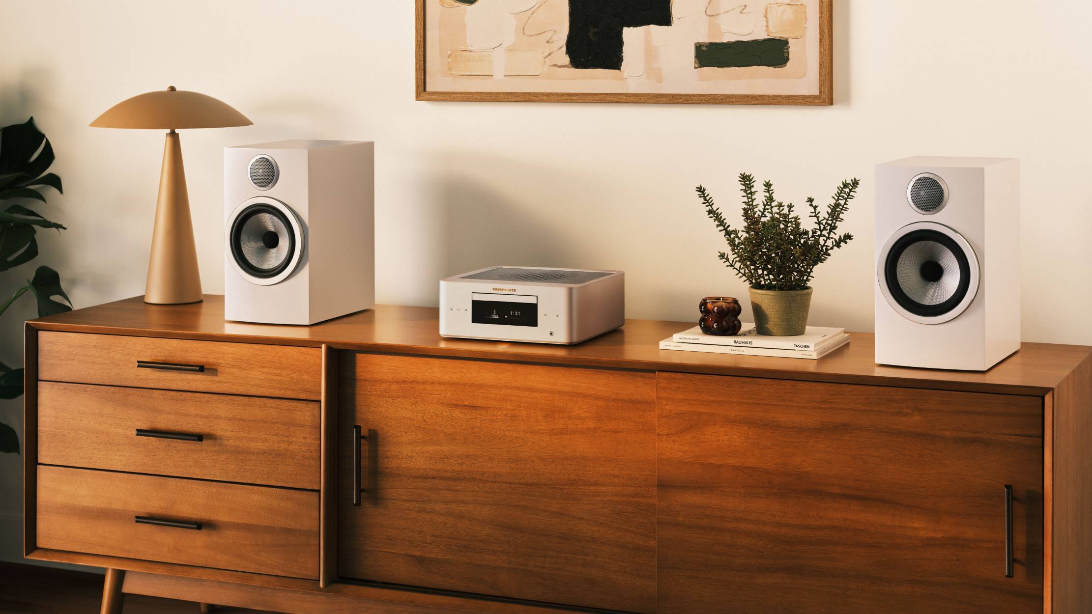The Marantz MCR 60n on a shelf, with a speaker on either side.