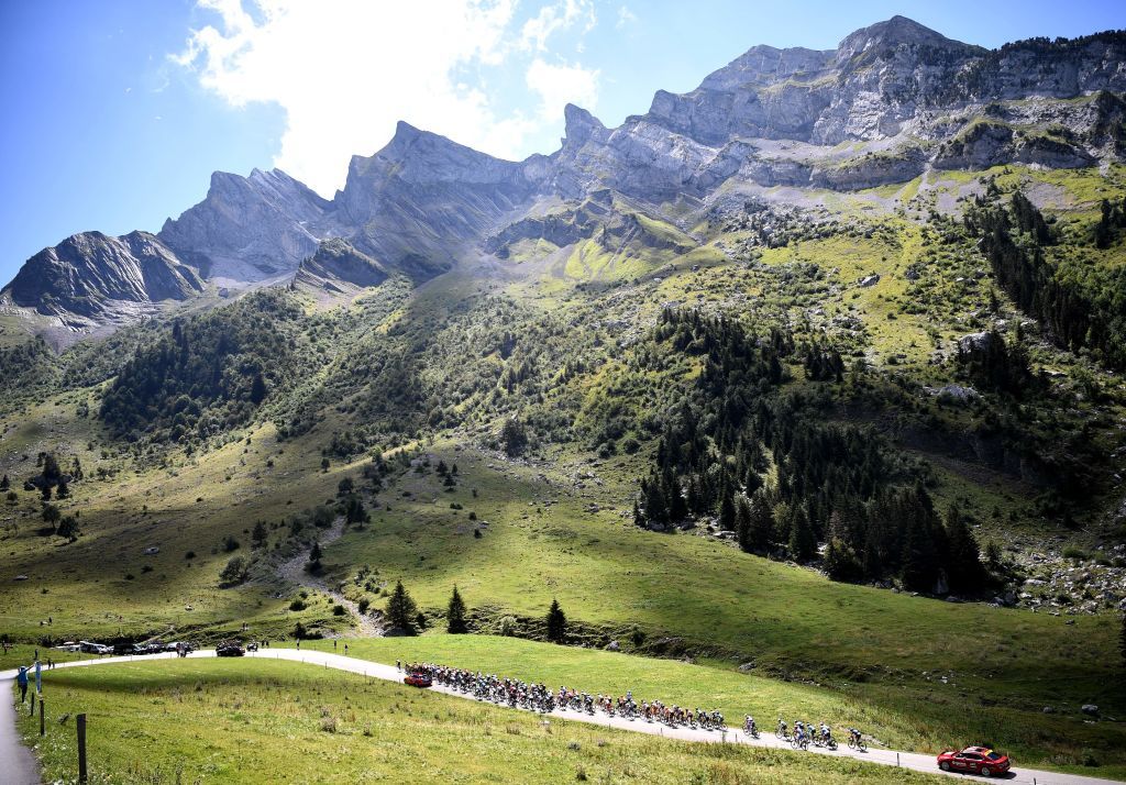 The pack of riders climb during the fourth stage of the 72nd edition of the Criterium du Dauphine cycling race 153 km between Ugine and Megeve on August 15 2020 Photo by AnneChristine POUJOULAT AFP Photo by ANNECHRISTINE POUJOULATAFP via Getty Images