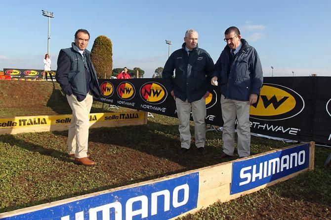UCI officials examining the barrier section at the Rome World Cup venue