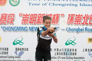 Stage one wininer Lizzie Armitstead (Garmin-Cervelo) uncorks the bubbly.