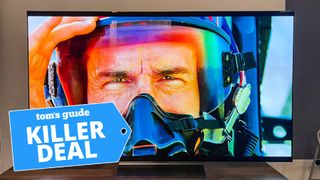 A photo of the LG C2 OLED TV displaying footage from Top Gun: Maverick