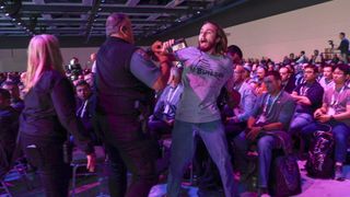A demonstrator is removed from the audience as they interrupt a presentation by Microsoft Chairman and CEO Satya Nadella at the Microsoft Build 2025 conference in Seattle, Washington on May 19, 2025.