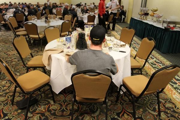 Mark Cavendish sits alone at the HTC-Columbia dining table, enjoying some solitude during a slightly later breakfast than the rest of the team.