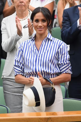 Meghan, Duchess of Sussex attends day twelve of the Wimbledon Tennis Championships at the All England Lawn Tennis and Croquet Club on July 13, 2018 in London, England
